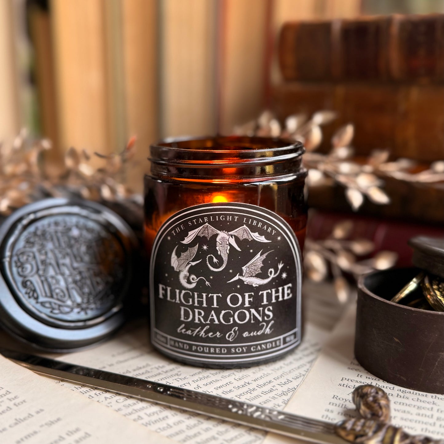 Flight of the Dragons bookish candle. Leather & Oudh.