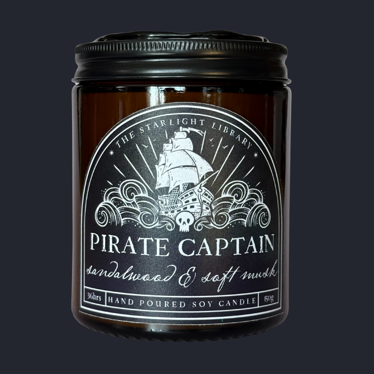 A Pirate Captain candle against a matching navy studio background.