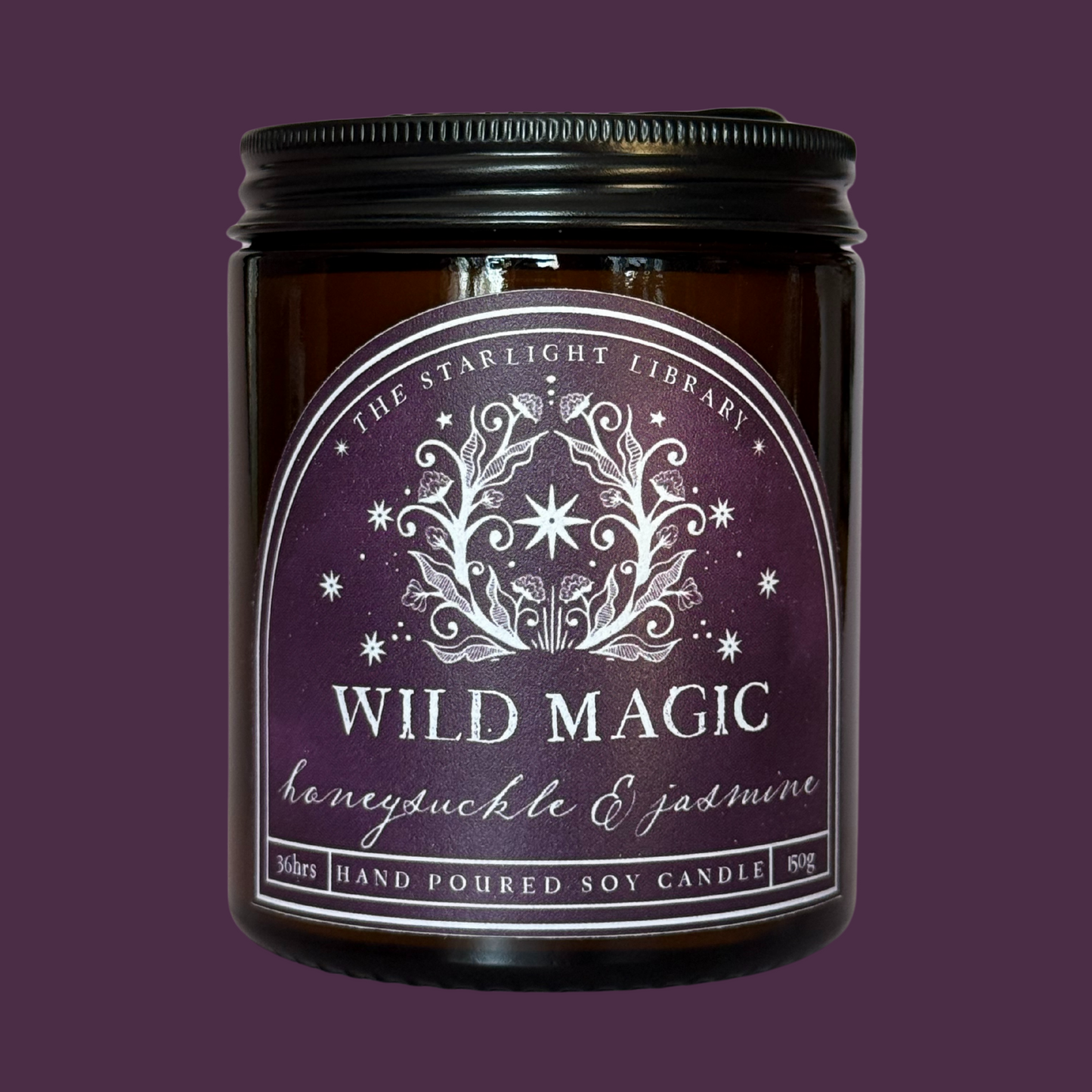 A Wild Magic candle against a matching purple studio background.