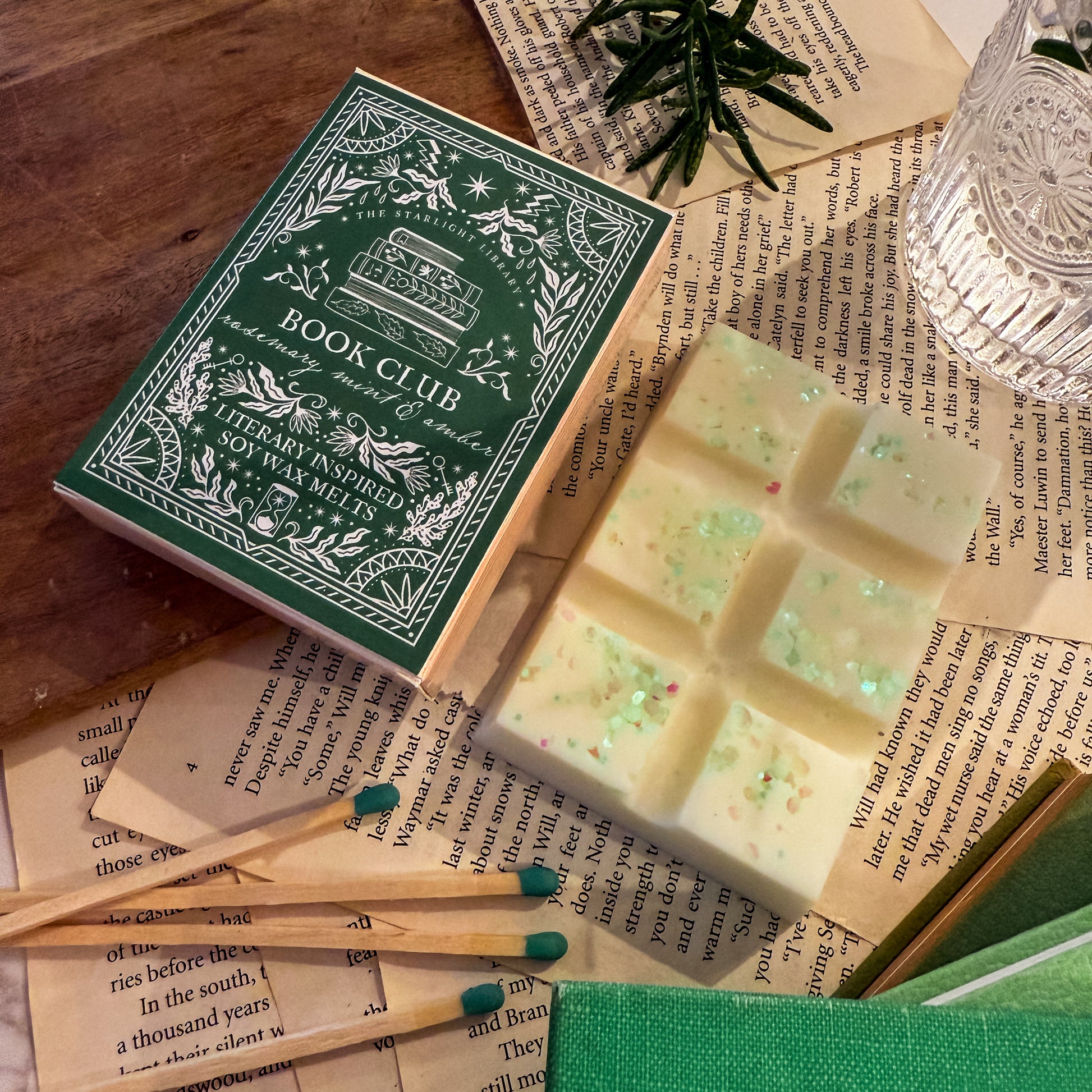 Book Club wax melt box and bar with matches on top of books