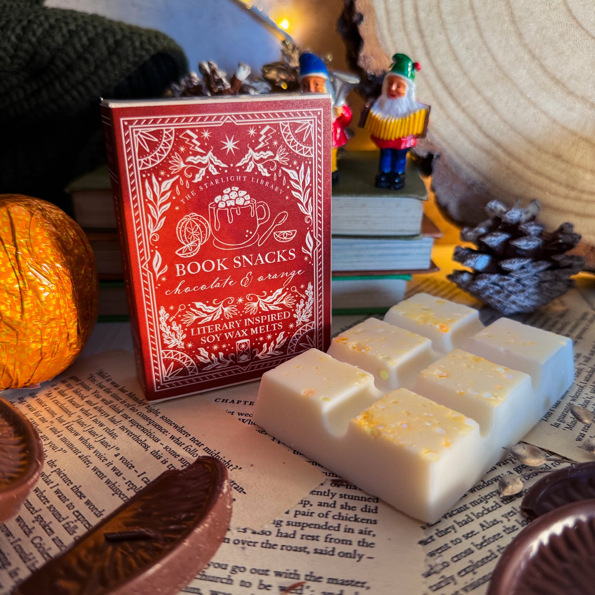 Book Snacks chocolate and candy packaging with wax melt bar on an open book
